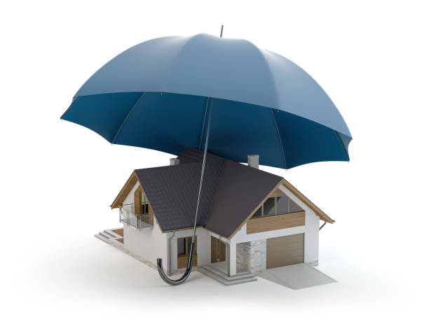 istock House insurance - umbrella and house model 1161590269