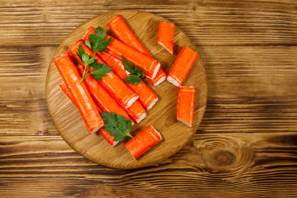 istock Crab sticks on cutting board on wooden table 1161591990