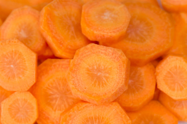 istock raw carrot slices closeup 1161592710