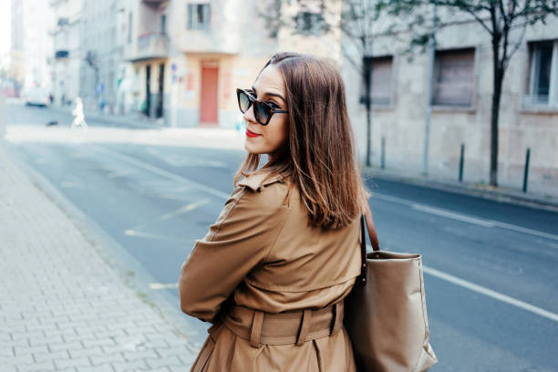 istock Woman walking down the street 1161594882
