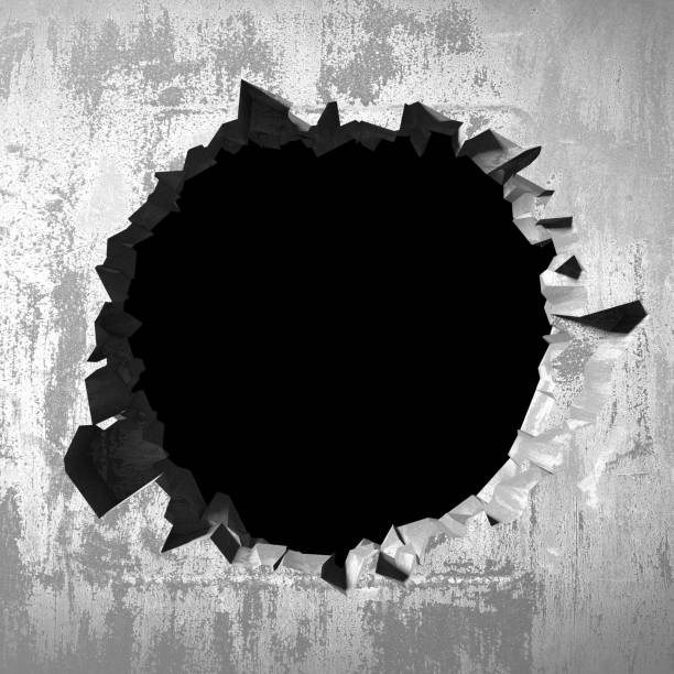 istock Dark cracked broken hole in concrete wall. Grunge background 1161598958