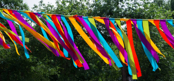 istock A garland of rainbow-colored fabric scraps. Hippie style. 1161599054