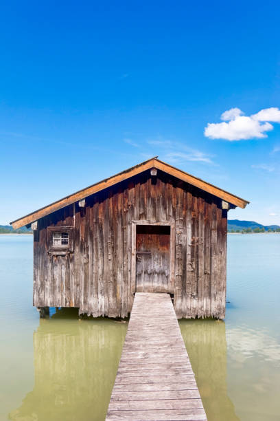 Picturesque boathouse on a mountain lake. HDR image