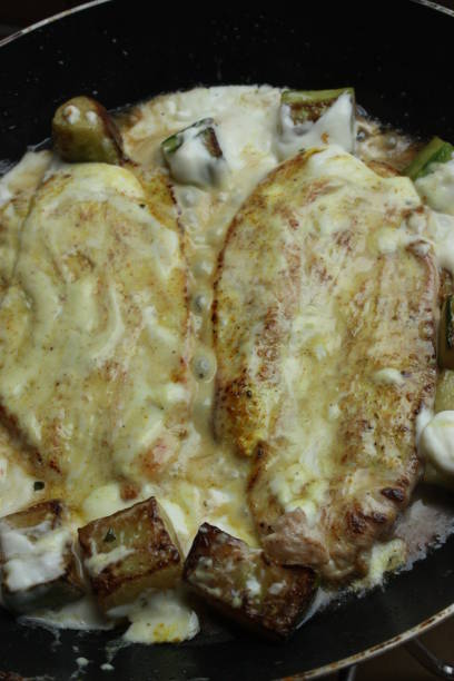 istock Turkey escalope being cooked in the pan with fresh cream 1161606220