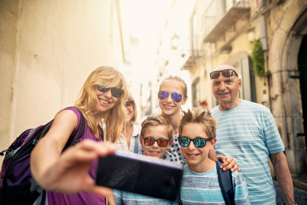 istock Multi generation family sightseeing Italian town 1161606469