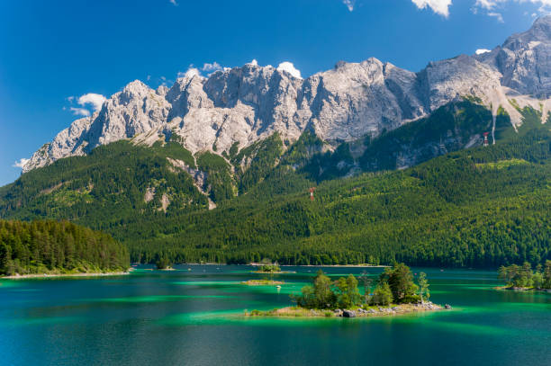 istock lake Eibsee at Zugspitze mountain range in Bavaria 1161609100