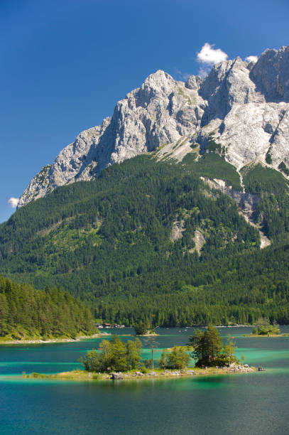 istock lake Eibsee at Zugspitze mountain range in Bavaria 1161609183