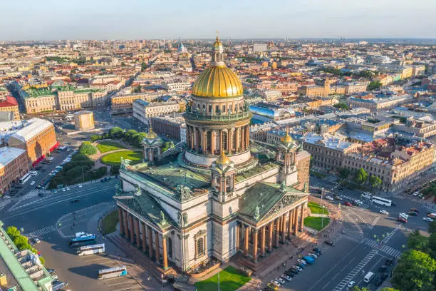 Aerial view of St. Isaac's Cathedral and the historic part of the city of Saint-Petersburg evening sunlight