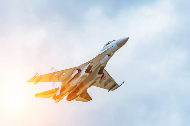 Rapidly taking off combat fighter in the air. Rapidly taking off combat fighter in the air solar wind attack stock pictures, royalty-free photos & images