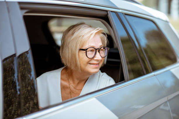 Senior woman in the car
