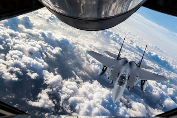 Fighter Jet Mid-air Refueling Fighter Jet Mid-air Refueling military tanker airplane photos stock pictures, royalty-free photos & images