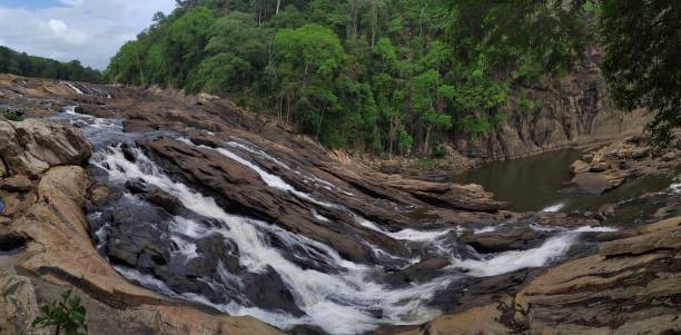 istock Water flowing through the mountains slopes in valparai 1161611065