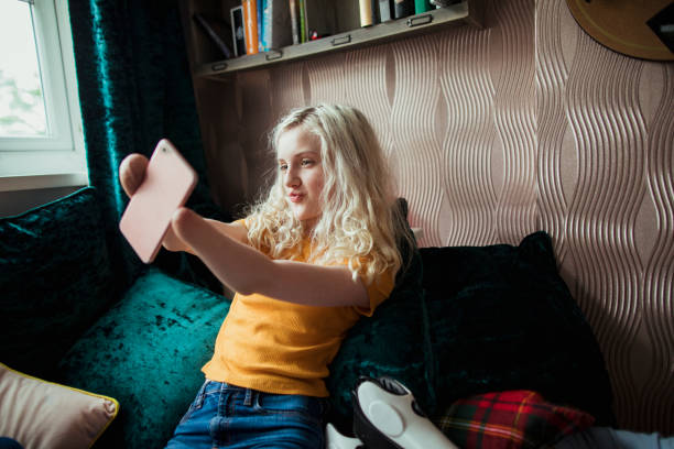 istock Confident Young Girl Taking A Selfie 1161612066