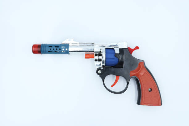 istock plastic gun for kids isolated on white background. 1161612187