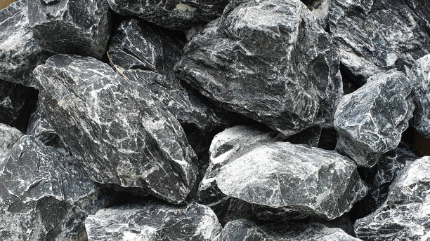istock Close-up of seamless quarry stone grey and white texture 1161616017