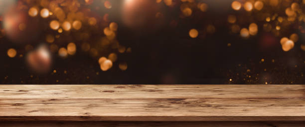 istock Abstract bokeh background with old table_ 1161619154