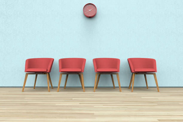 стулья и часы в зале ожидания - two dimensional shape three dimensional shape red ideas стоковые фото и изображения
