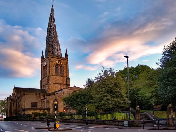 The church of St Mary and All Saints, Chesterfield, well known for its crooked spire, photographed at sunset The Church of St Mary and All Saints, Chesterfield, Derbyshire, England, UK is a fourteenth century Anglican church famous for its twisted, leaning spire. circa 14th century photos stock pictures, royalty-free photos & images