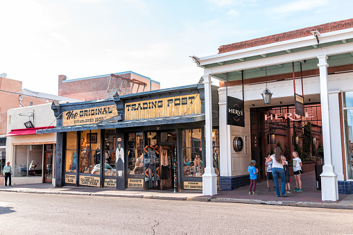 Santa Fe, USA - June 14, 2019: Old town street and trading post in United States New Mexico city with old architecture