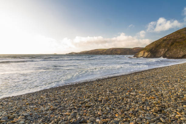 istock Welsh coast on wind day, blue sky and clouds. 1161638392