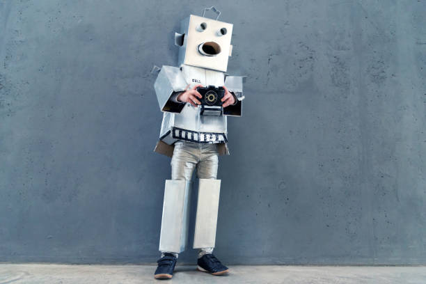 istock Homebuilt robot taking pictures in front of concrete wall - Artificial intelligence concept 1161639207