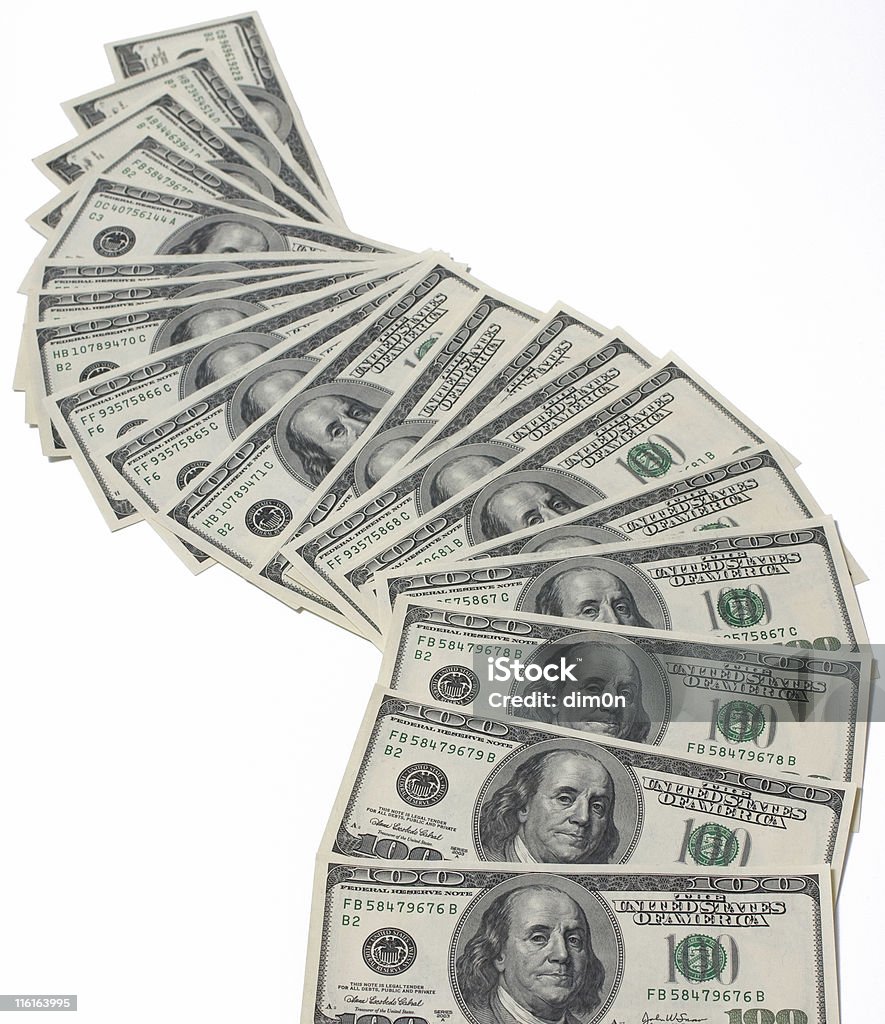 A fan of 100 dollar bills on a white background Many dollar banknotes isolated on white American One Hundred Dollar Bill Stock Photo