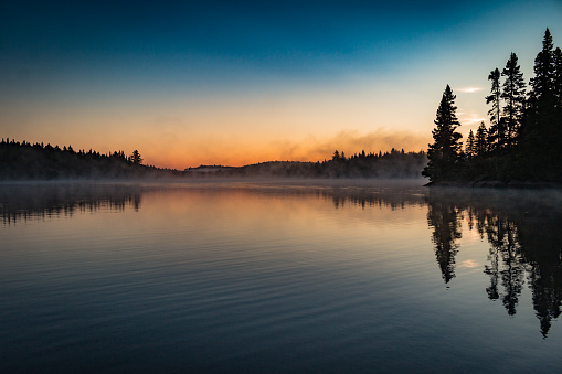 Idyllic Sunrise Mirroring On The Lake - Parc de la Mauricie, Quebec