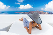 Vacation travel woman relaxing enjoying Santorini