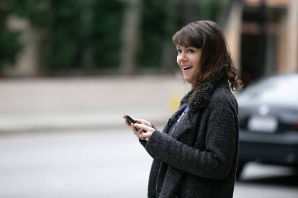 istock Waiting for a Rideshare or Checking Mobile Phone for GPS Navigation 1161645114