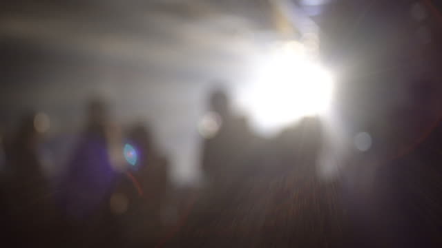4k Blurred people in the light background