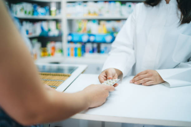 istock Selling medicine in drug store 1161651484