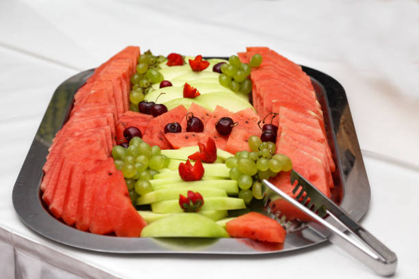 istock Sliced watermelon pulp and melon decorated with ripe cherries 1161653127