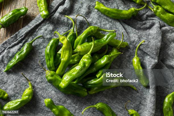 Raw Green Organic Shishito Peppers Stock Photo - Download Image Now - Shishito Pepper, Asia, Backgrounds