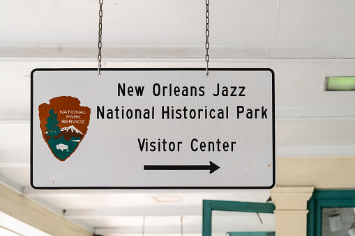 New Orleans, USA - April 23, 2018: Street sign to New Orleans Jazz National Historic Park visitor center in Louisiana famous city