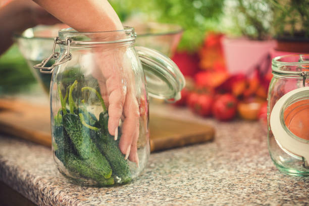 istock Preserving Fresh Organic Vegetables in the Jars 1161663485