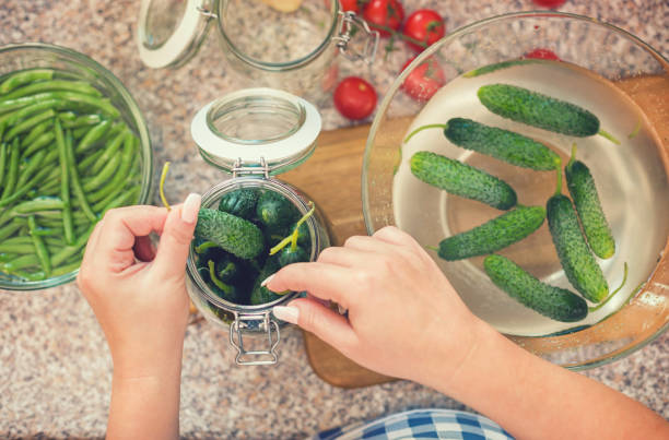 istock Preserving Fresh Organic Vegetables in the Jars 1161663487