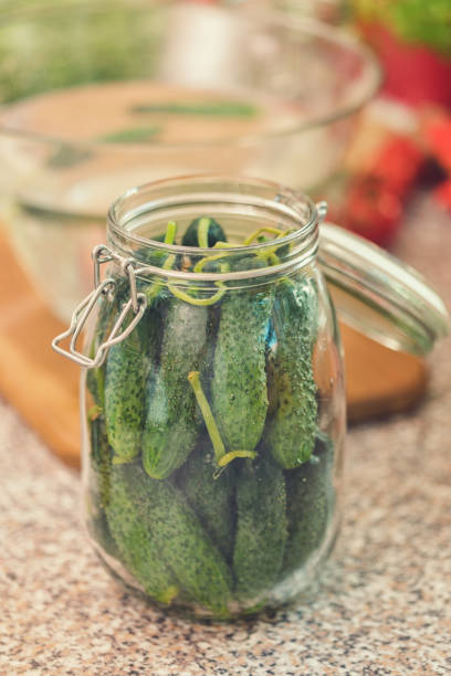 istock Preserving Fresh Organic Cucumbers in the Jars 1161663552