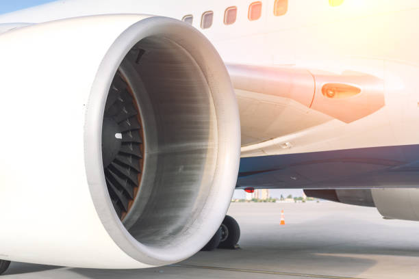 istock Close-up big commercial plane engine standing on airfiled after aircraft arrival on bright sunny day 1161663647