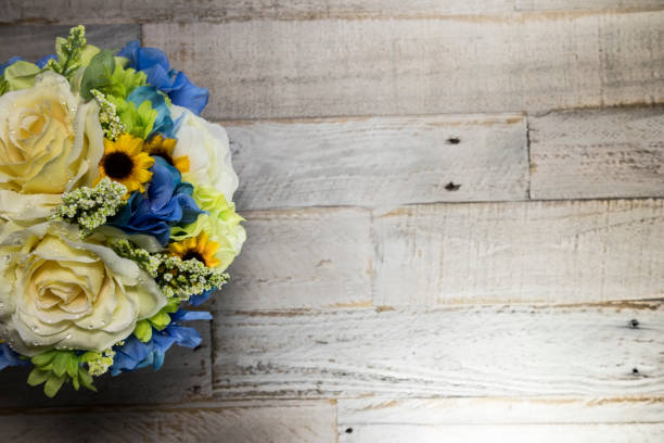istock Flowers on White Distressed Wood Macro 1161666354