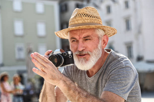 istock Senior photographer arranging his models 1161669757