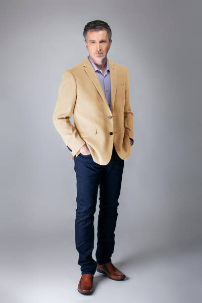 istock Posh Middle Aged Man Wearing Beige Jacket 1161671159