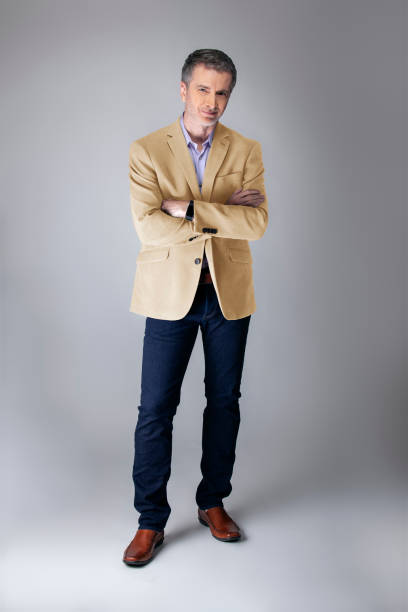 istock Posh Middle Aged Man Wearing Beige Jacket 1161671161