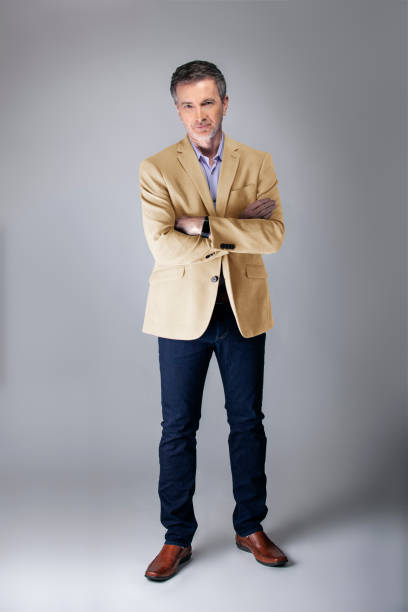istock Posh Middle Aged Man Wearing Beige Jacket 1161671162