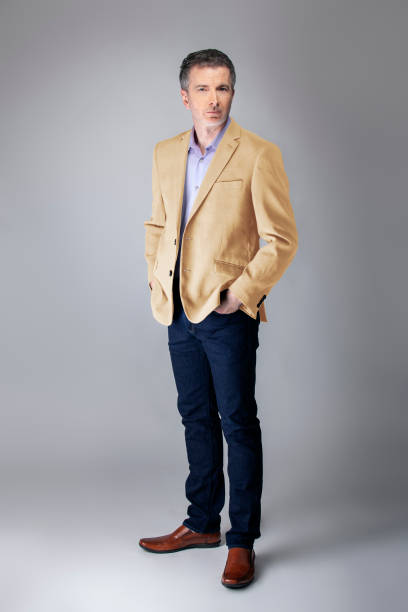 istock Posh Middle Aged Man Wearing Beige Jacket 1161671168