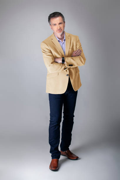 istock Posh Middle Aged Man Wearing Beige Jacket 1161671191
