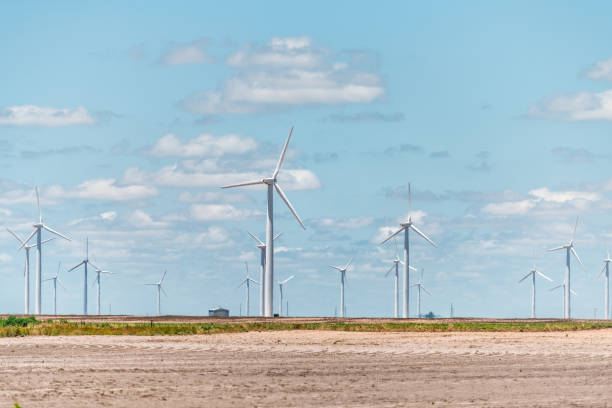 Wind turbine farm near Roscoe Sweetwater Texas in USA in prairie with rows of many machines for energy Wind turbine farm near Roscoe Sweetwater Texas in USA in prairie with rows of many machines for energy abilene texas stock pictures, royalty-free photos & images