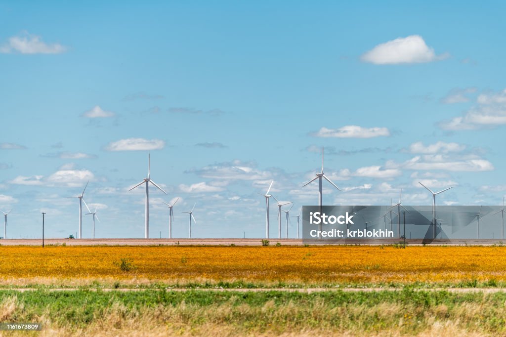 Wind turbine farm generator near Roscoe or Sweetwater Texas in USA in prairie with rows of many machines for energy Texas Stock Photo