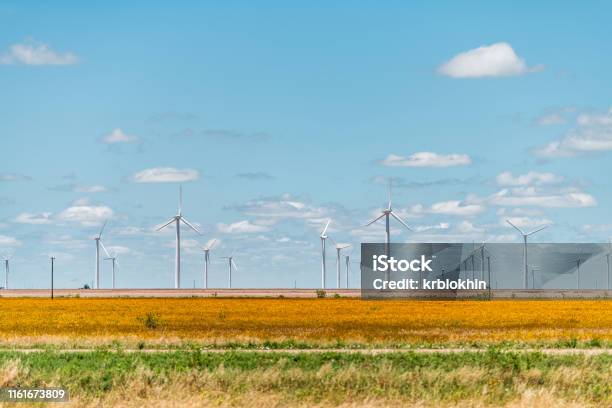 Wind Turbine Farm Generator Near Roscoe Or Sweetwater Texas In Usa In Prairie With Rows Of Many Machines For Energy Stock Photo - Download Image Now