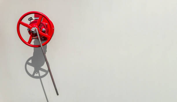 istock Fire hydrant valve on rough white surface. Conception of fire safety. 1161680693