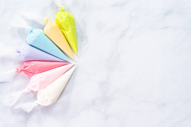 istock Piping bags with pastel color royal icing 1161686204